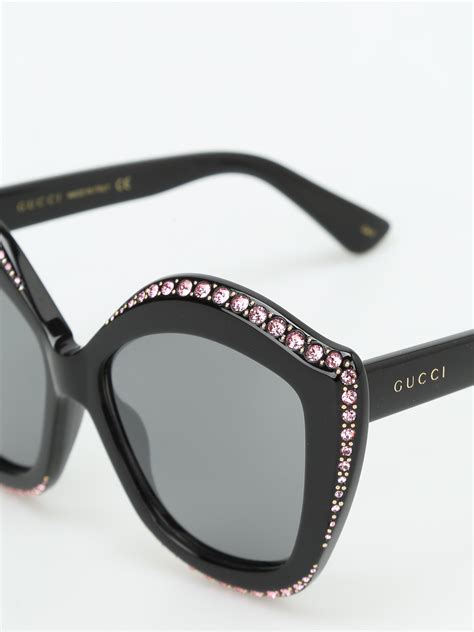 pink Gucci sunglasses with rhinestones